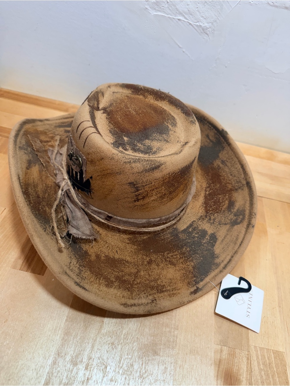 Rustic Brown Distressed Western Hat with Feather and Rope Trim